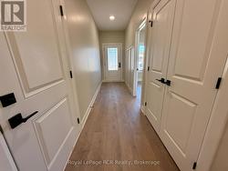 Hallway with entrance to garage - 