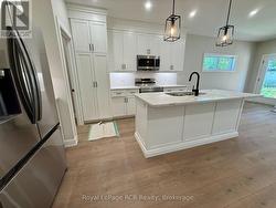 Kitchen with new S.S. appliances - 