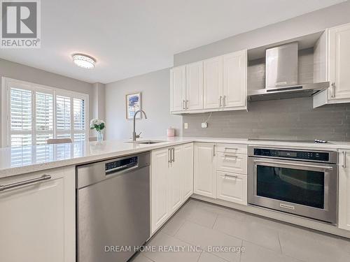 Sunlit kitchen with ample counter space - 3746 Windhaven Drive, Mississauga, ON - Indoor Photo Showing Kitchen With Stainless Steel Kitchen