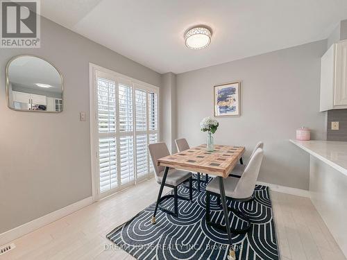 Cozy dining area with patio doors - 3746 Windhaven Drive, Mississauga, ON - Indoor Photo Showing Dining Room