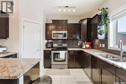 417 Golden Willow Way, Warman, SK - Indoor Photo Showing Kitchen With Double Sink