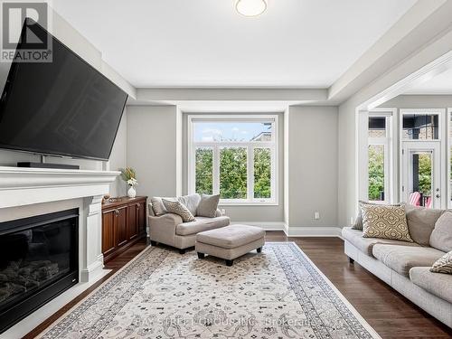 Family Room with Gas Fireplace - 39 Cairns Gate, King, ON - Indoor Photo Showing Living Room With Fireplace