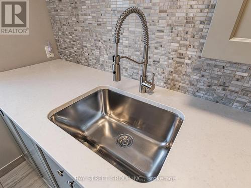 Extended Cabinets and Deep Stainless Laundry Sink - 39 Cairns Gate, King, ON - Indoor Photo Showing Kitchen With Double Sink