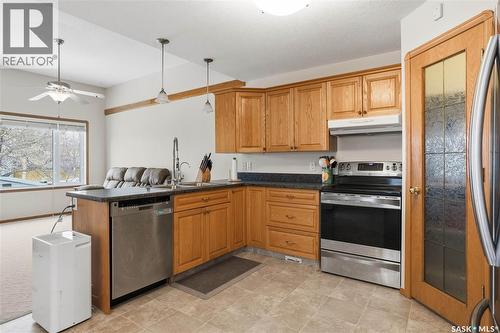 1134 Degelman Drive, Regina, SK - Indoor Photo Showing Kitchen With Double Sink