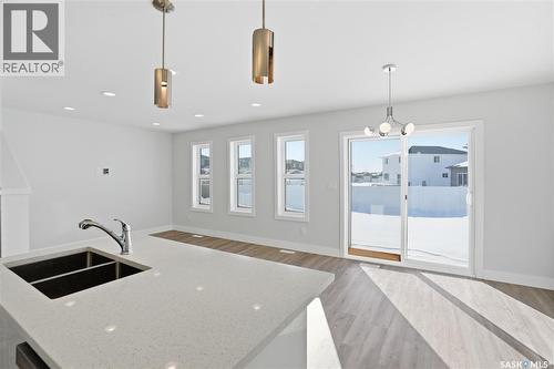 111 Stromberg Crescent, Saskatoon, SK - Indoor Photo Showing Kitchen With Double Sink