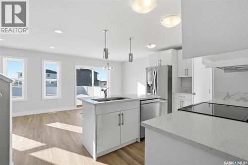 111 Stromberg Crescent, Saskatoon, SK - Indoor Photo Showing Kitchen With Double Sink