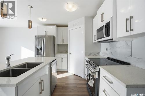 111 Stromberg Crescent, Saskatoon, SK - Indoor Photo Showing Kitchen With Double Sink With Upgraded Kitchen