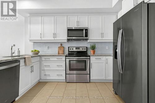 1109 - 260 Villagewalk Boulevard, London North, ON - Indoor Photo Showing Kitchen With Stainless Steel Kitchen With Upgraded Kitchen