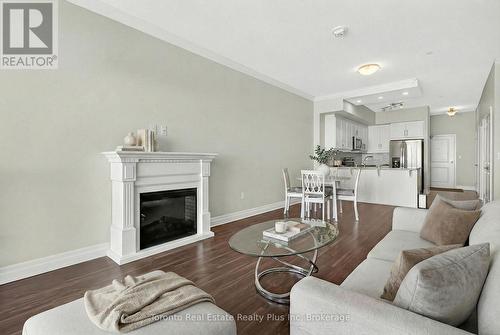 1109 - 260 Villagewalk Boulevard, London North, ON - Indoor Photo Showing Living Room With Fireplace
