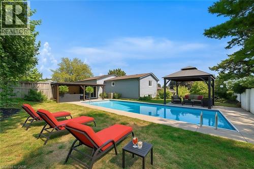 Virtually Staged - 23 Bismark Drive, Cambridge, ON - Outdoor With In Ground Pool With Backyard