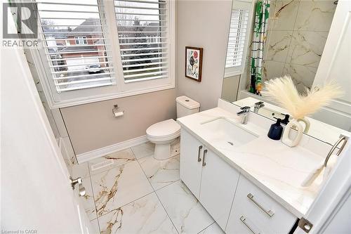 Bathroom featuring vanity, a shower with curtain, and light marble finish floors - 5109 Blue Spruce Avenue, Burlington, ON - Indoor Photo Showing Bathroom
