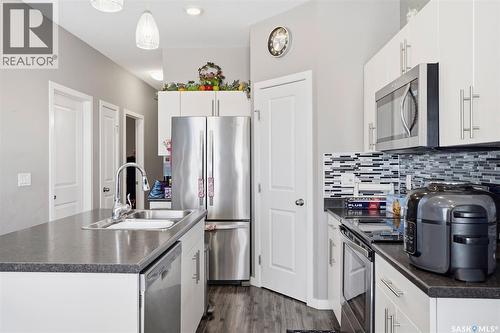 3930 33Rd Street W, Saskatoon, SK - Indoor Photo Showing Kitchen With Double Sink With Upgraded Kitchen