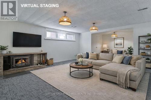 15 Manorhampton Drive, Toronto, ON - Indoor Photo Showing Living Room With Fireplace