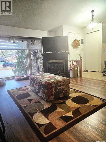 101 3Rd Street W, Leader, SK - Indoor Photo Showing Bedroom With Fireplace