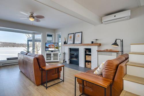 Salon - 230 Rue Larose, Dunham, QC - Indoor Photo Showing Living Room With Fireplace