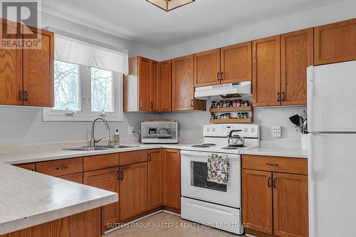 156 Pruyn Crescent, Loyalist (Bath), ON - Indoor Photo Showing Kitchen With Double Sink