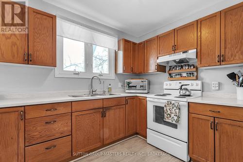 156 Pruyn Crescent, Loyalist (Bath), ON - Indoor Photo Showing Kitchen With Double Sink