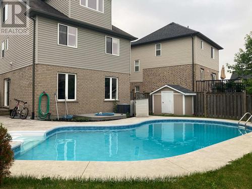 77 Laughland Lane, Guelph (Pineridge/Westminster Woods), ON - Outdoor With In Ground Pool With Exterior