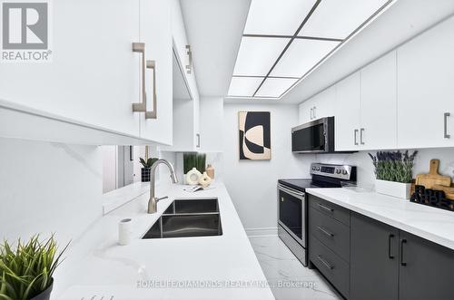 2002 - 5 Concorde Place, Toronto, ON - Indoor Photo Showing Kitchen With Double Sink