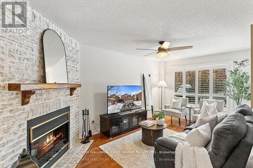 4 Winterberry Drive, Whitby, ON - Indoor Photo Showing Living Room With Fireplace