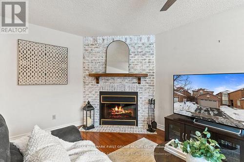 4 Winterberry Drive, Whitby, ON - Indoor Photo Showing Living Room With Fireplace