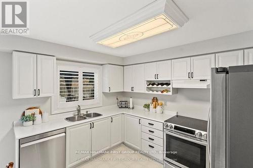 4 Winterberry Drive, Whitby, ON - Indoor Photo Showing Kitchen With Double Sink