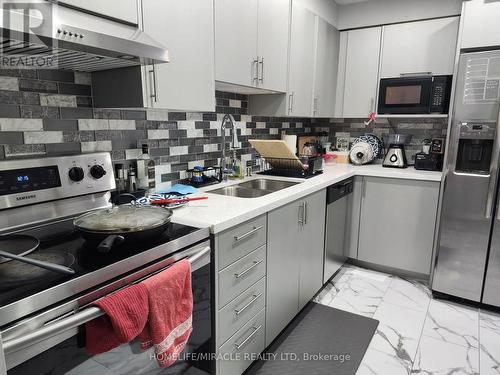 504 - 25 Fairview Road W, Mississauga, ON - Indoor Photo Showing Kitchen With Double Sink