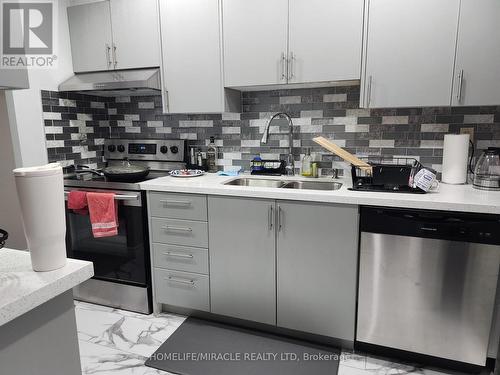 504 - 25 Fairview Road W, Mississauga, ON - Indoor Photo Showing Kitchen With Double Sink