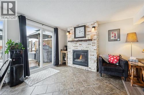 33 Chesterton Lane, Guelph, ON - Indoor Photo Showing Living Room With Fireplace