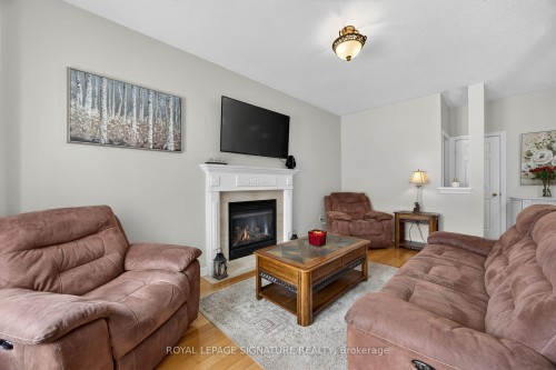 67 Penvill Trail, Barrie, ON - Indoor Photo Showing Living Room With Fireplace