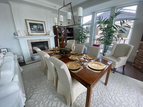 Salle à manger - 206-284 Ch. Du Bord-Du-Lac-Lakeshore, Pointe-Claire, QC - Indoor Photo Showing Dining Room With Fireplace