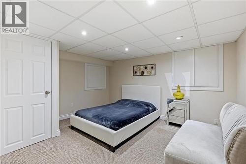 Carpeted bedroom featuring a paneled ceiling - 1073 North Service Road, Hamilton, ON - Indoor Photo Showing Bedroom