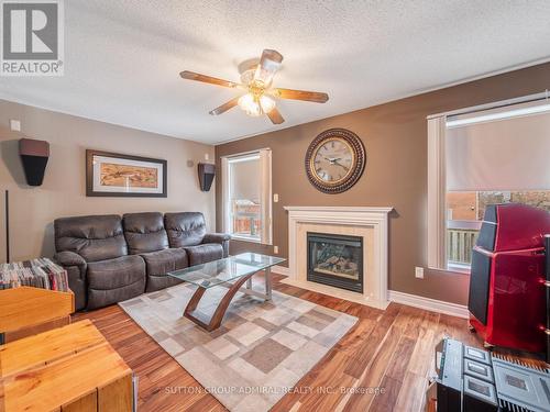 82 Belmont Boulevard, Halton Hills, ON - Indoor Photo Showing Living Room With Fireplace