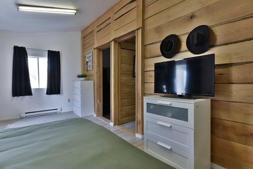 Chambre à coucher principale - 1423 Ch. De Val-Des-Lacs, Sainte-Sophie, QC - Indoor Photo Showing Other Room