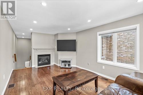 70 - 2555 Thomas Street, Mississauga, ON - Indoor Photo Showing Living Room With Fireplace