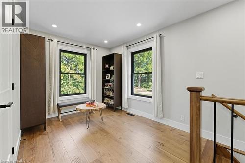 Sitting room with light wood finished floors, healthy amount of natural light, and recessed lighting - 115 Lakeshore Road, Port Burwell, ON - Indoor Photo Showing Other Room