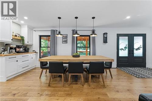 Dining space featuring recessed lighting, light wood-style flooring, and french doors - 115 Lakeshore Road, Port Burwell, ON - Indoor