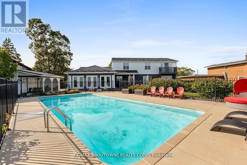 1073 North Service Road, Hamilton, ON - Outdoor With In Ground Pool With Backyard