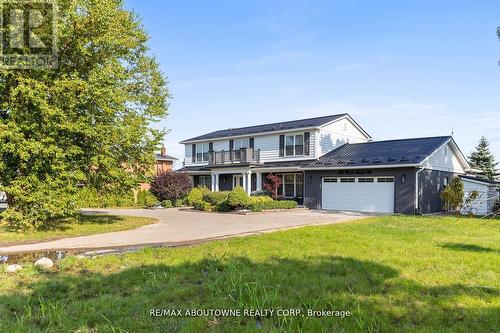 1073 North Service Road, Hamilton, ON - Outdoor With Facade