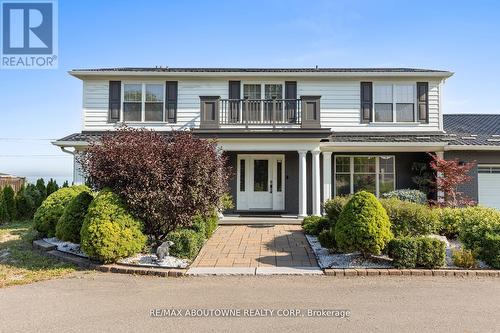 1073 North Service Road, Hamilton, ON - Outdoor With Facade