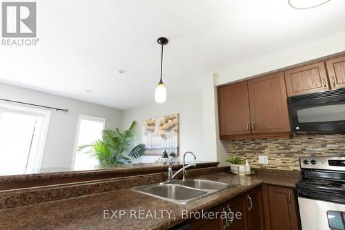 1319 Countrystone Drive, Kitchener, ON - Indoor Photo Showing Kitchen With Double Sink
