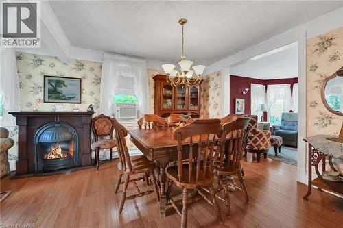 110 Livingston Avenue, Grimsby, ON - Indoor Photo Showing Dining Room With Fireplace
