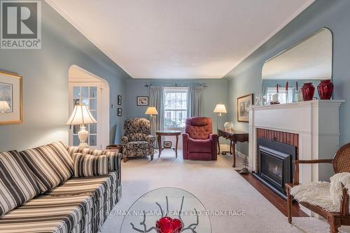 2 Gardiner Place, St. Catharines (Downtown), ON - Indoor Photo Showing Living Room With Fireplace