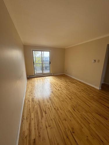 Living room - 4717 Rue De Colombey, Montréal (Saint-Léonard), QC - Indoor Photo Showing Other Room