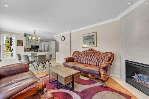 Salle familiale - 8 Rue Picasso, Notre-Dame-De-L'Île-Perrot, QC - Indoor Photo Showing Living Room With Fireplace
