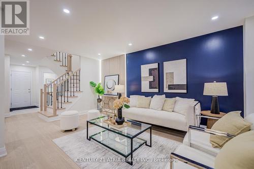 10 - 590 Sandhurst Circle, Toronto, ON - Indoor Photo Showing Living Room