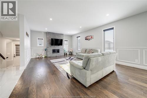 4433 Belmont, Comber, ON - Indoor Photo Showing Living Room With Fireplace