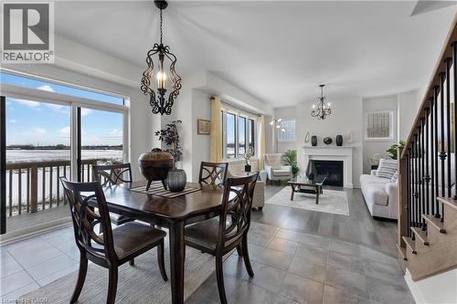 229 Vanilla Trail, Thorold, ON - Indoor Photo Showing Dining Room With Fireplace