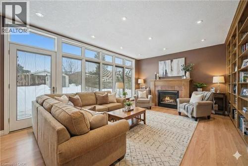 Virtually staged - 123 Lorraine Avenue, Kitchener, ON - Indoor Photo Showing Living Room With Fireplace
