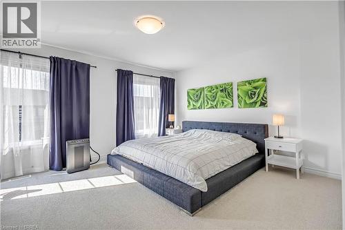 View of carpeted bedroom - 29 Bellhouse Avenue, Brantford, ON - Indoor Photo Showing Bedroom